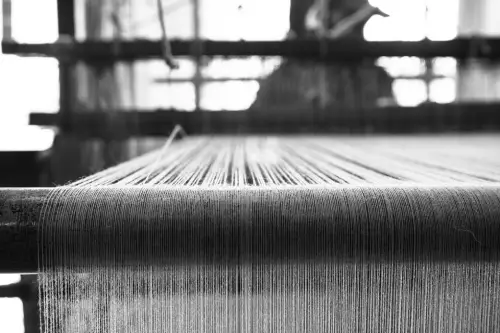 WEAVING THE FABRIC